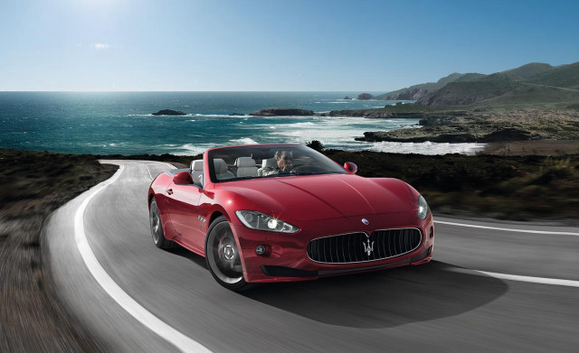 Red masera driving ocean road free wallpaper - medium preview image