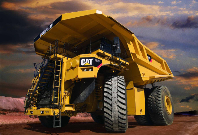 Yellow dumptruck dirtroad cloudy sky free wallpaper - medium preview image