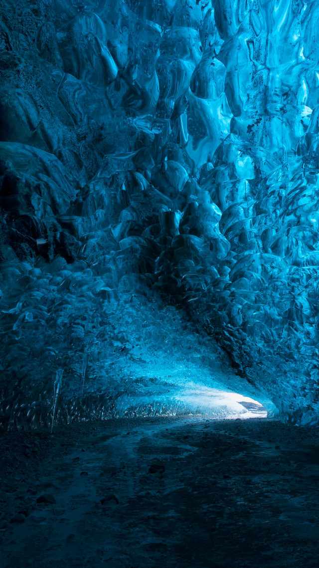 Man standing cave light blue free wallpaper - medium preview image