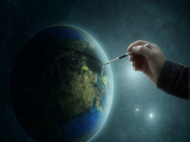 Hand holding paintbrush planet stars free wallpaper - medium preview image
