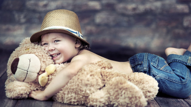 Boy smiling teddy bear straw free wallpaper - medium preview image