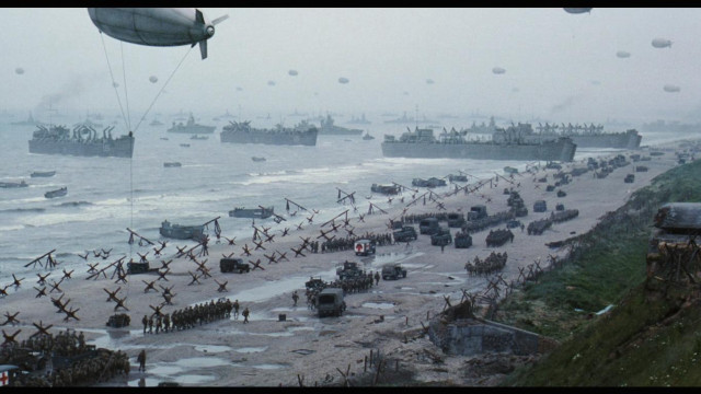 Military vehicles beach ocean crowd free wallpaper - medium preview image