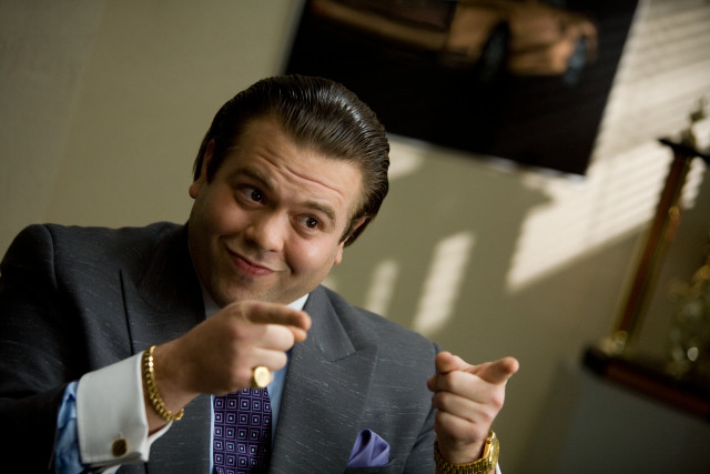 Man suit pointing camera smile free wallpaper - medium preview image