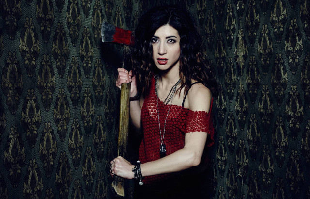 Woman large axe red top free wallpaper - medium preview image