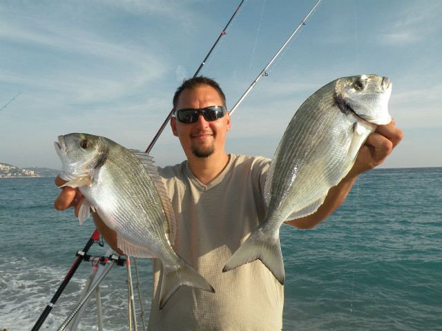 Man fishing boat ocean fish free wallpaper - medium preview image