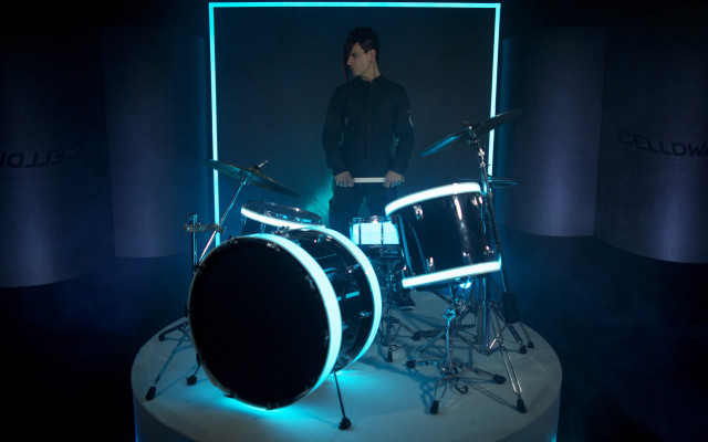 Man drum set dark room free wallpaper - medium preview image