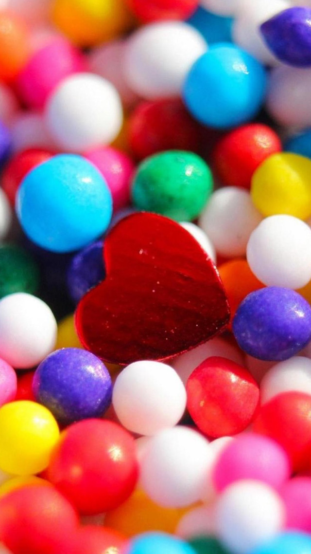 Heart candy closeup bokeh shiny free wallpaper - medium preview image