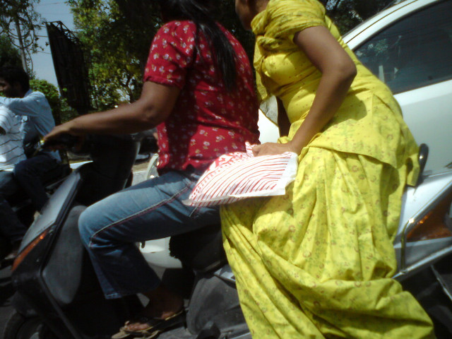 Woman yellow dress man motorcycle free wallpaper - medium preview image