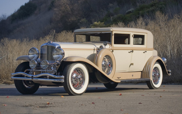 Old model car parked hill free wallpaper - medium preview image