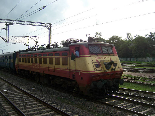 Train traveling tracks field grass free wallpaper - medium preview image