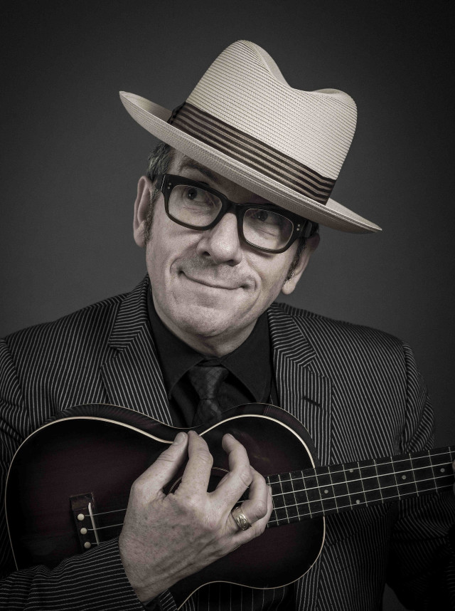Man suit hat guitar smiling free wallpaper - medium preview image