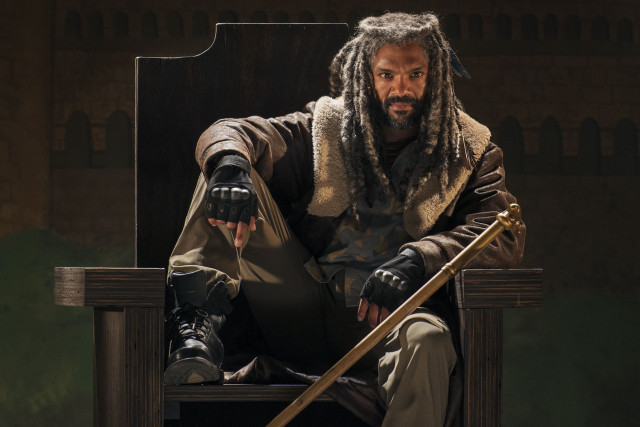 Man dreadlocks sitting chair sword free wallpaper - medium preview image