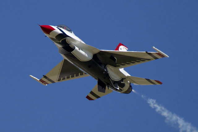 Jet flying blue sky smoke #8 free wallpaper - medium preview image