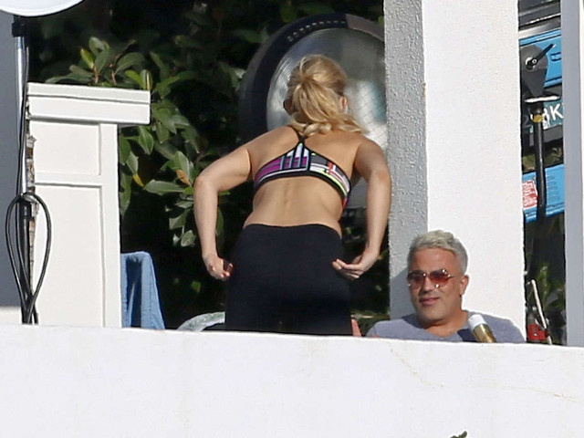 Woman bikini man black suit free wallpaper - medium preview image