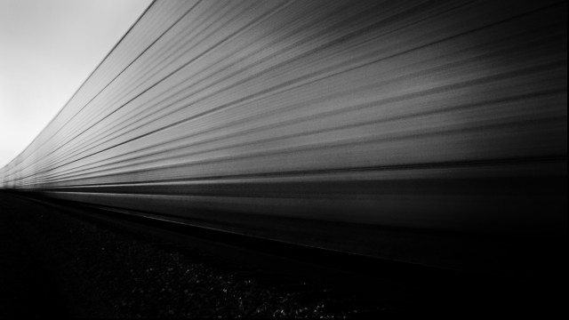 Train forest track cloudy sky free wallpaper - medium preview image