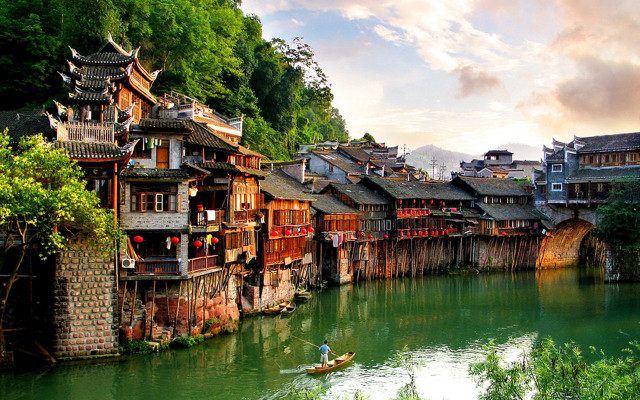 River buildings man boat scenery free wallpaper - medium preview image