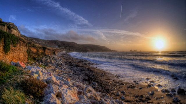 Beach cliff water sunset plane free wallpaper - medium preview image