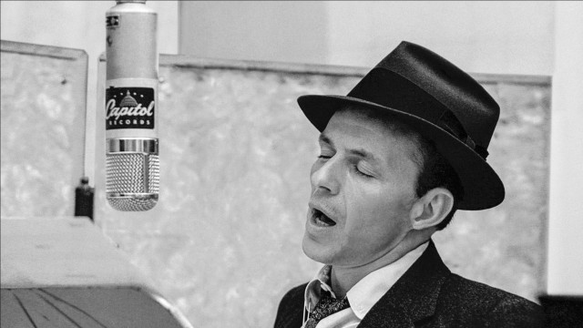Man suit hat singing microphone free wallpaper - medium preview image