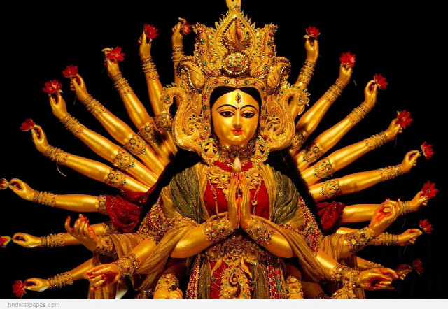 Woman statue many arms outstretched #2 free wallpaper - medium preview image