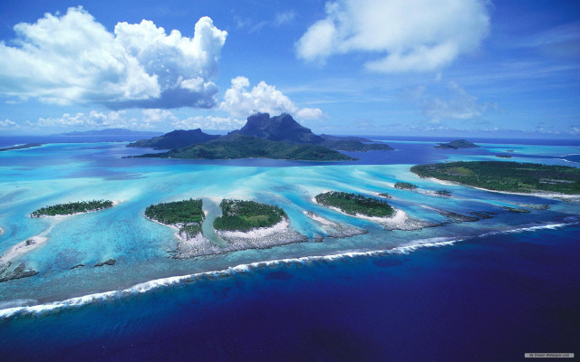 Island archipelago ocean clouds sky free wallpaper - medium preview image