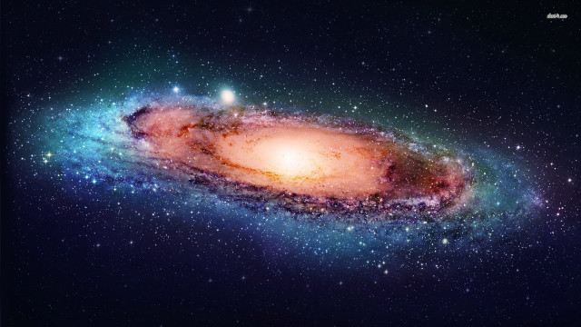 Large galaxy bright orange center free wallpaper - medium preview image