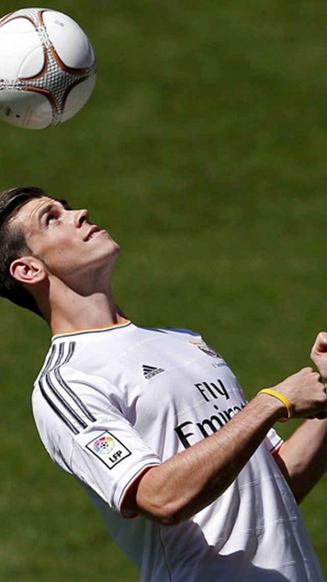 Man white shirt playing soccer free wallpaper - medium preview image