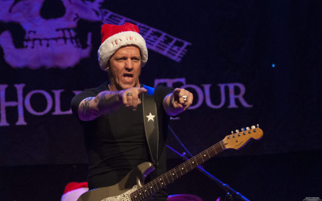 Man santa hat guitar stage free wallpaper - medium preview image