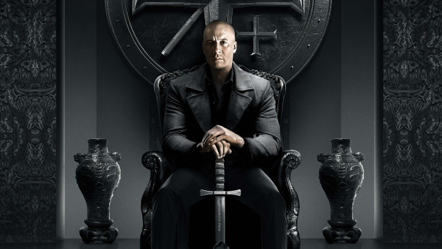 Man sitting chair sword hand free wallpaper - medium preview image