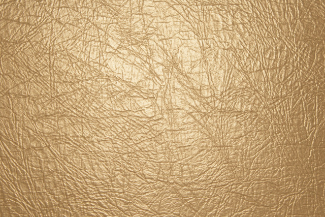 Gold leather texture grainy pattern free wallpaper - medium preview image
