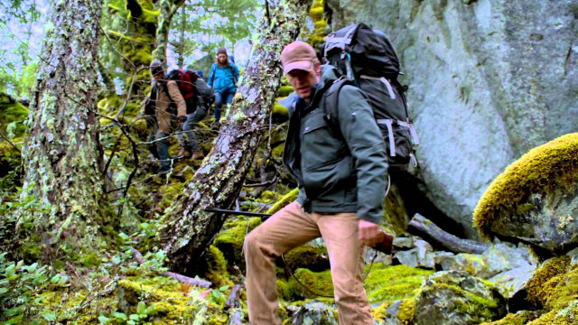 Man backpack climbing mountain trail free wallpaper - medium preview image