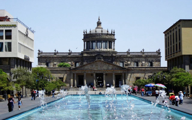 Large building fountain people walking #2 free wallpaper - medium preview image