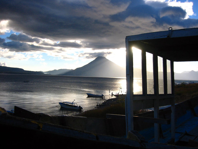 Boat water cloudy sky mountains free wallpaper - medium preview image