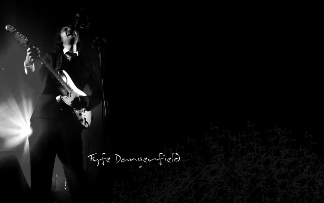 Man playing guitar on stage #7 free wallpaper - medium preview image