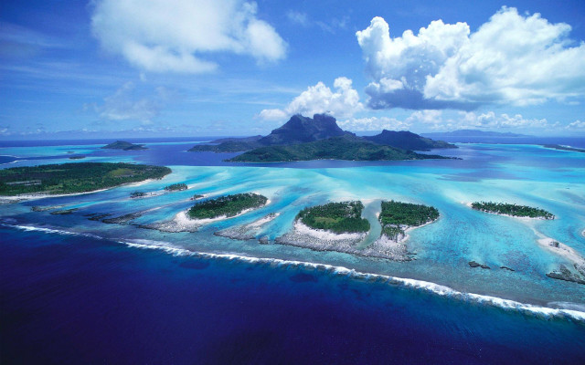 Small islands ocean mountain blue free wallpaper - medium preview image