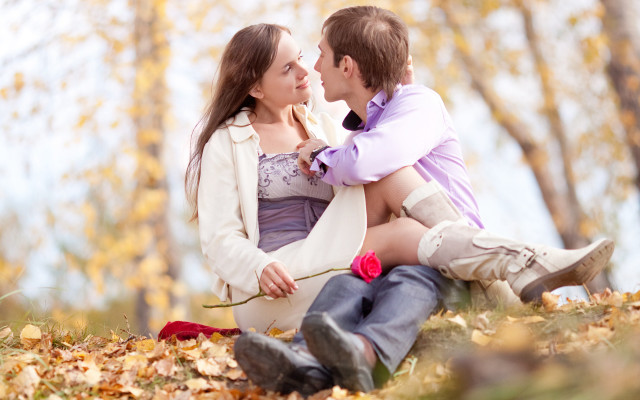 Man woman sitting ground leaves #6 free wallpaper - medium preview image
