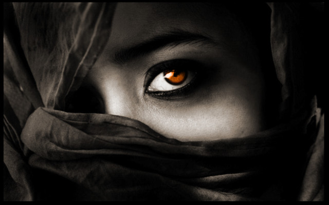 Woman orange eyes scarf serious free wallpaper - medium preview image