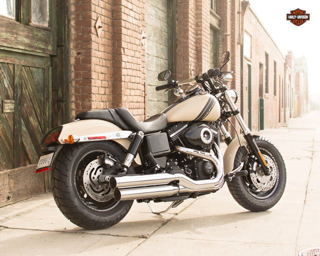Motorcycle parked street building door free wallpaper - medium preview image