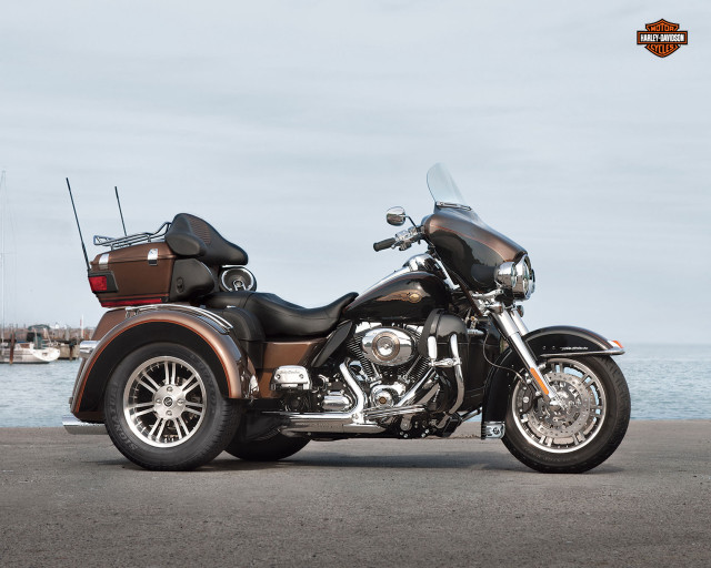 Motorcycle parked road water boats free wallpaper - medium preview image