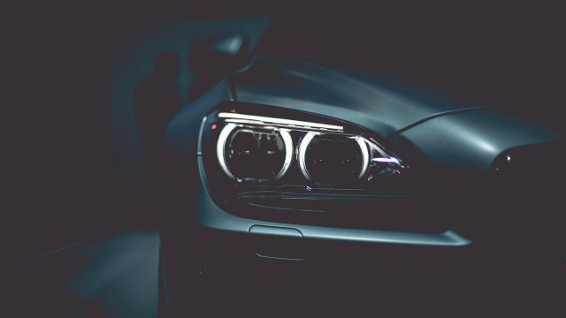 Black car black background repeated free wallpaper - medium preview image