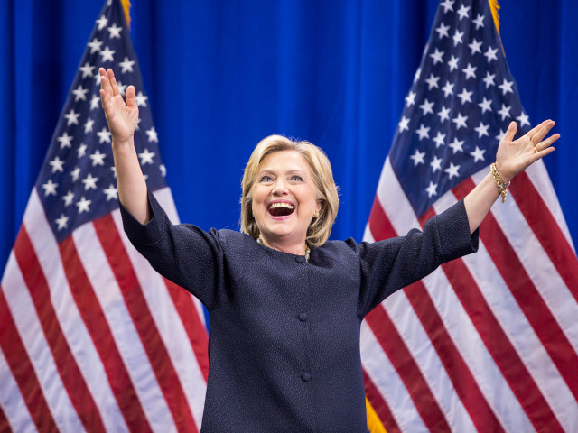 Woman american flags hands raised free wallpaper - medium preview image