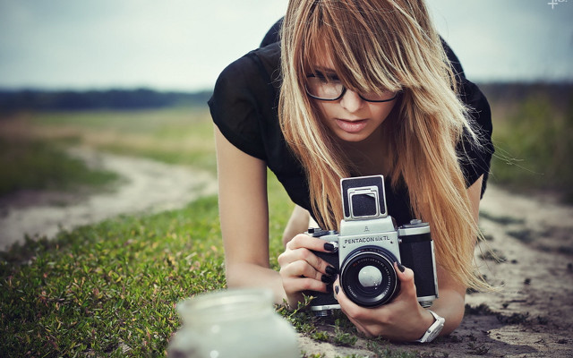 Woman taking picture camera dirt free wallpaper - medium preview image