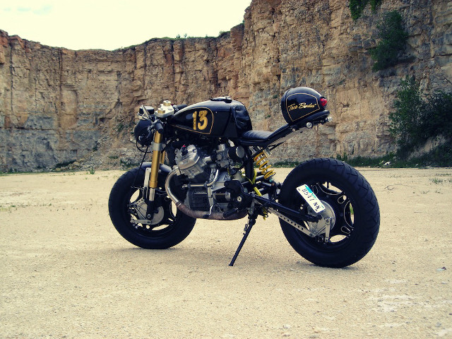 Motorcycle parking lot mountain rock free wallpaper - medium preview image