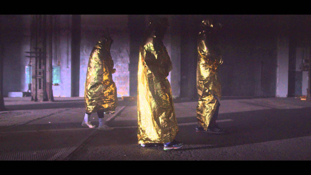 Gold raincoats night street skateboard free wallpaper - medium preview image