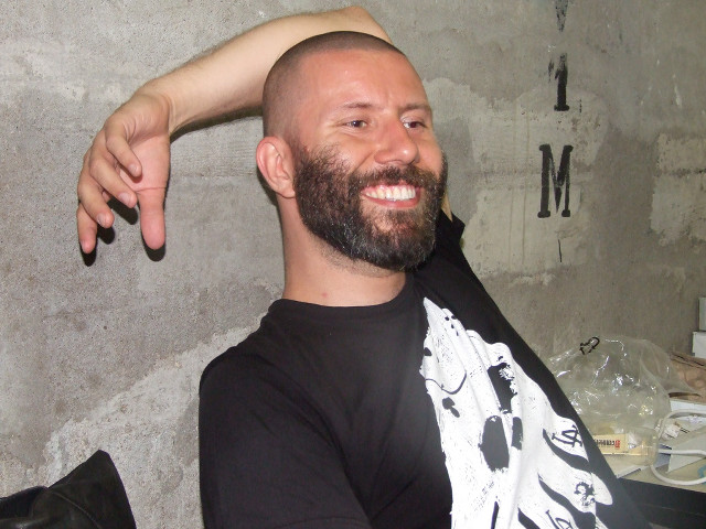Smiling man haircut bearded barber free wallpaper - medium preview image