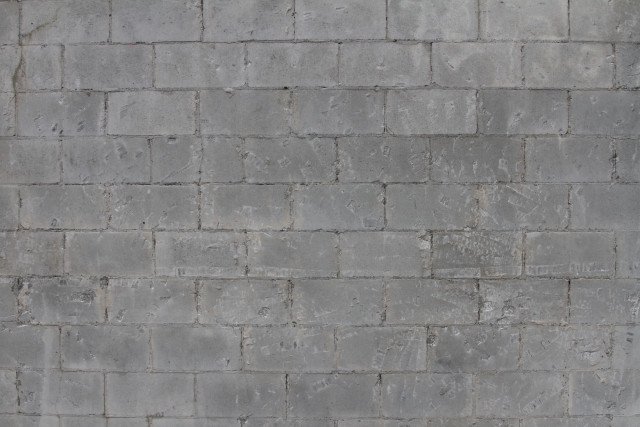 Person walking street brick wall free wallpaper - medium preview image