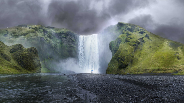 Man waterfall cloudy sky person free wallpaper - medium preview image