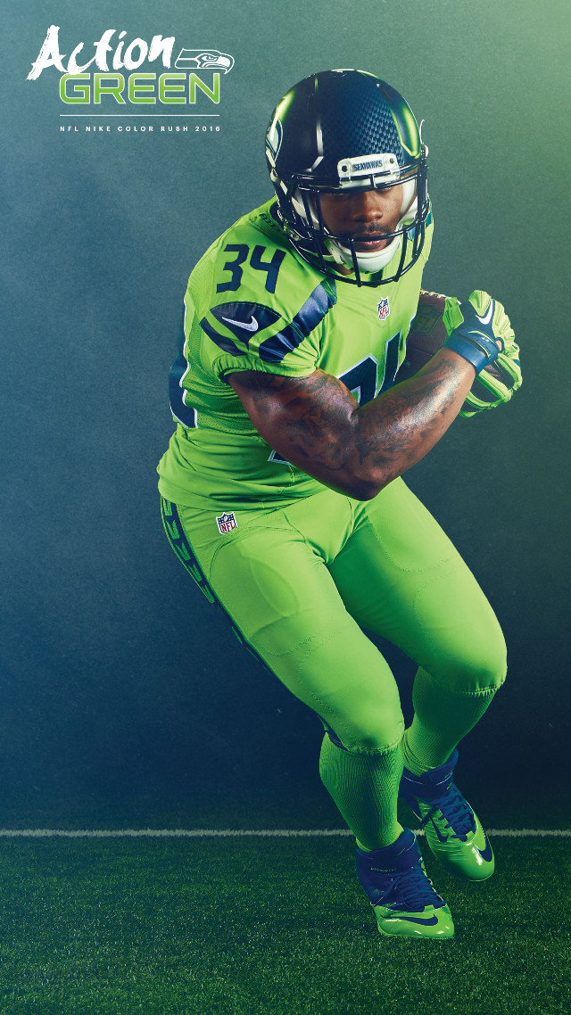Football player green uniform pose free wallpaper - medium preview image