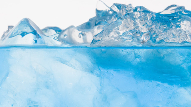 Blue iceberg ice chunks floating free wallpaper - medium preview image