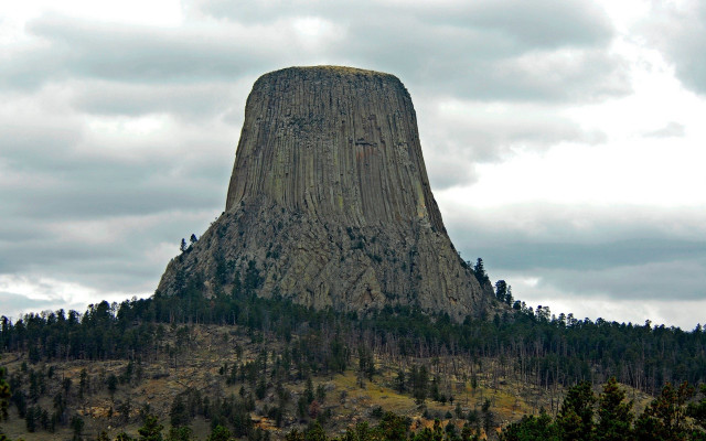 Tall rock formation trees cloudy free wallpaper - medium preview image
