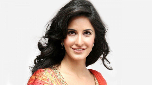 Woman red gold dress smiling free wallpaper - medium preview image